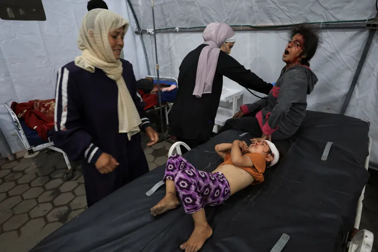 Israeli strikes kill more than 50 as school and housing hit