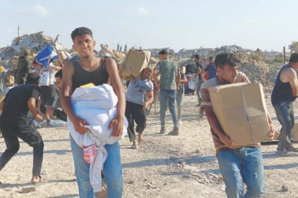 Palestinians storm aid centres despite concerns over checks
