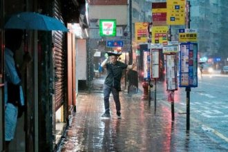 Hong Kong issues highest weather warning, as rains shut schools, courts and hospital wards