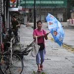 Typhoon Tapah makes landfall in China, prompting mass evacuations, closures