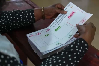 Guinea votes on new constitution to move from military to civilian rule