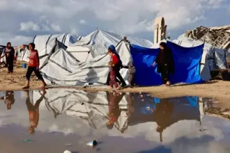 ‘Shivering from cold and fear’ as winter rains batter Gaza